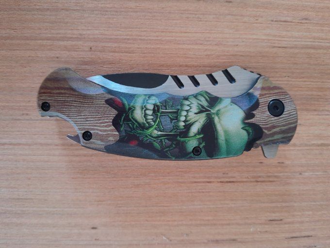 Couteau tête de mort verte