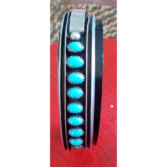 Bracelet foncé + pierres bleu
