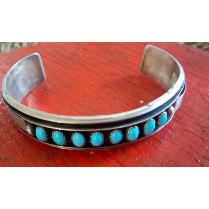 Bracelet foncé + pierres bleu