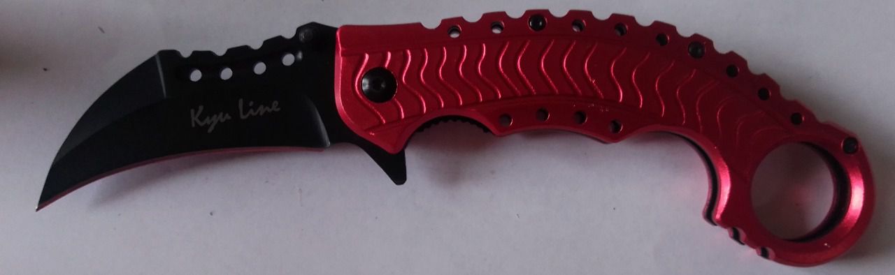 Couteau karambit rouge